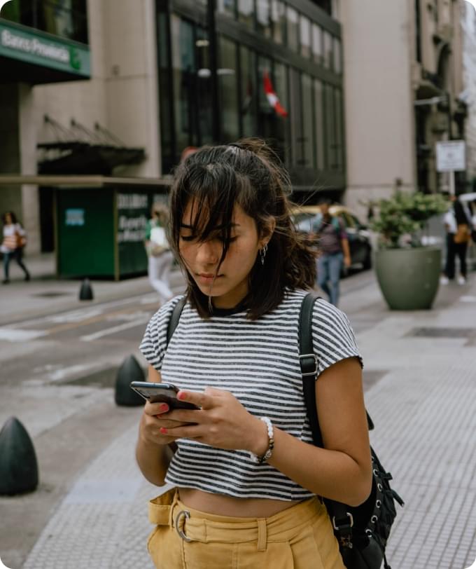 Woman with phone in hands